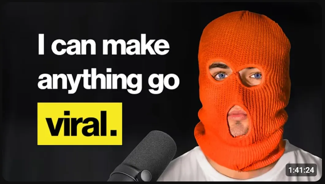 Colin and Samir YouTube thumbnail featuring a creator wearing an orange ski mask beside the text I can make anything go viral